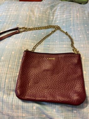 Lodis Pebbled Wine Leather Crossbody with Gold Chain